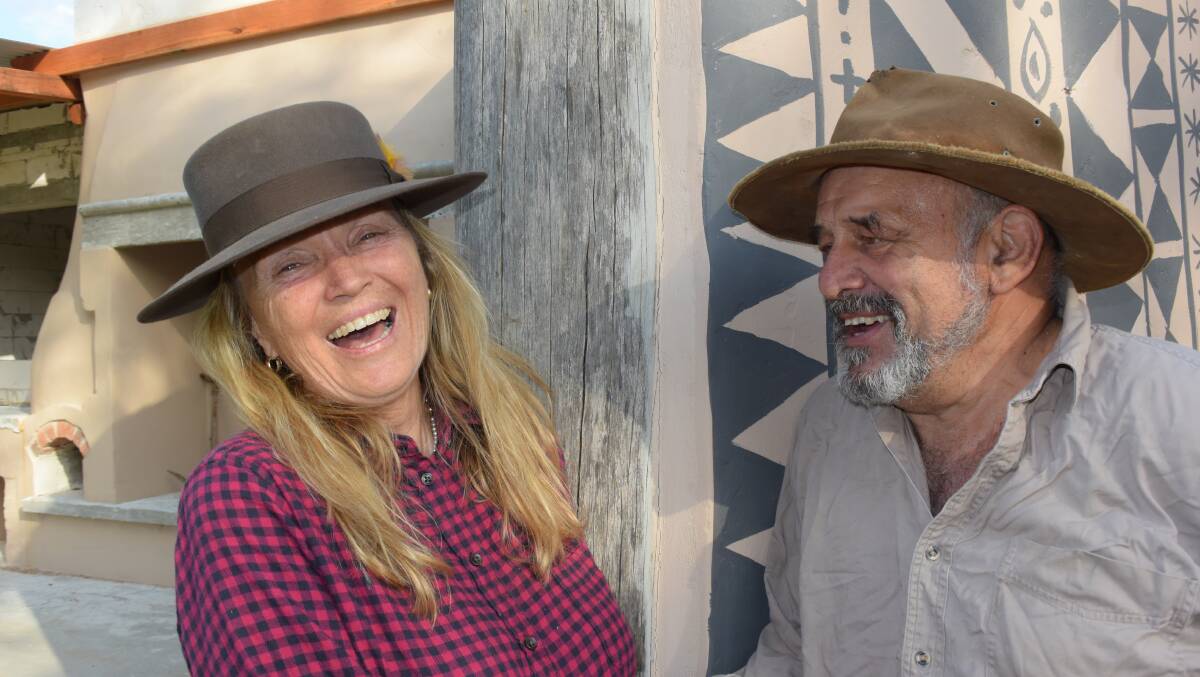 Sally Ayre-Smith and Marcus Skipper next to Marcus' creation at their property on the Macleay.