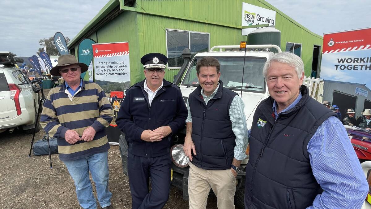 Dunedoo fire brigade captain David Bowman, deputy commissioner field operations, Peter McKechnie, NSW minister for lands and water Kevin Anderson, and NSW Farmers' president Xavier Martin, announcing the Farm Fire Unit Operational Guide at AgQuip on Thursday.