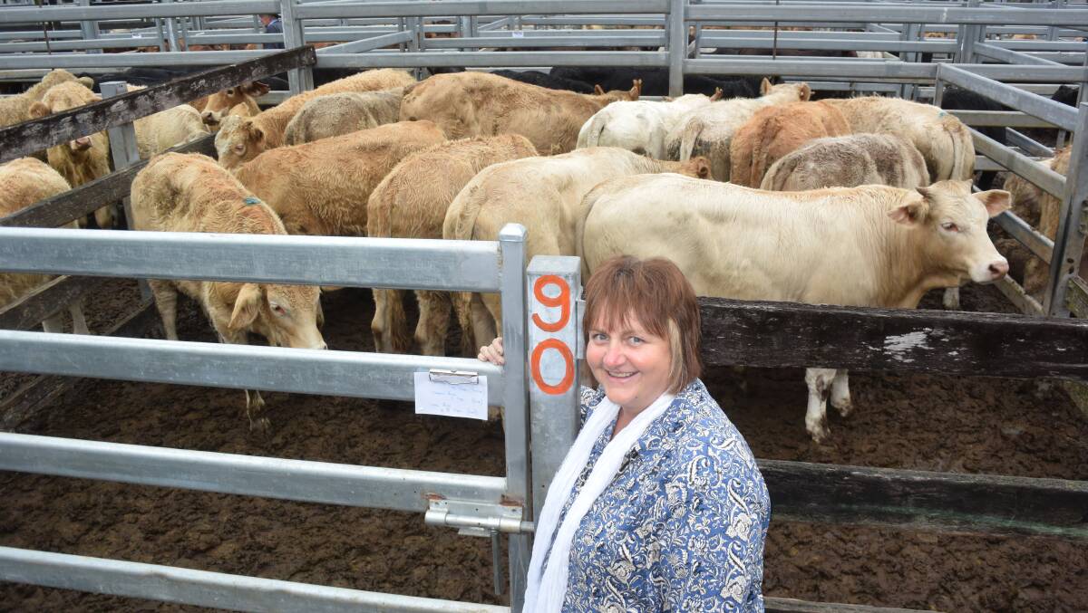 Melissa Prior, Bellbrook, with a pen of Wakefield Charolais/Brahman at 289kg which fetched 364c/kg to realise $1052, produced with help from her son Darby and Ellie. 