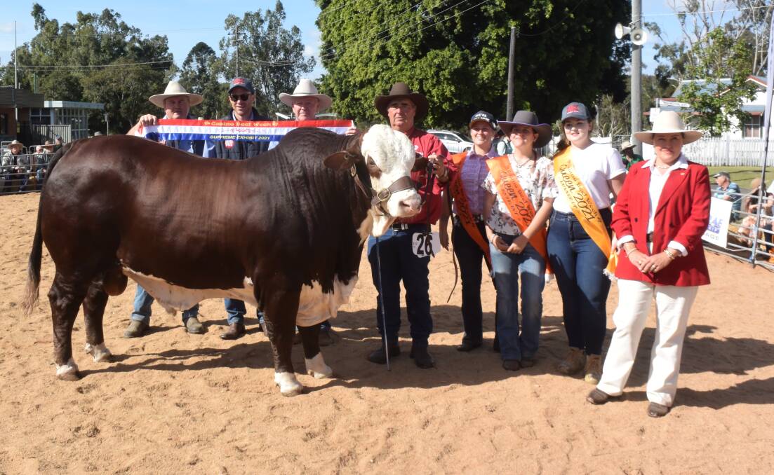 Braford bull Little Valley Magician with stud principal Doug Bennett, Stratheden; judge Leonie Ball, Singleton and members of the enthusiastic Beef Week committee.