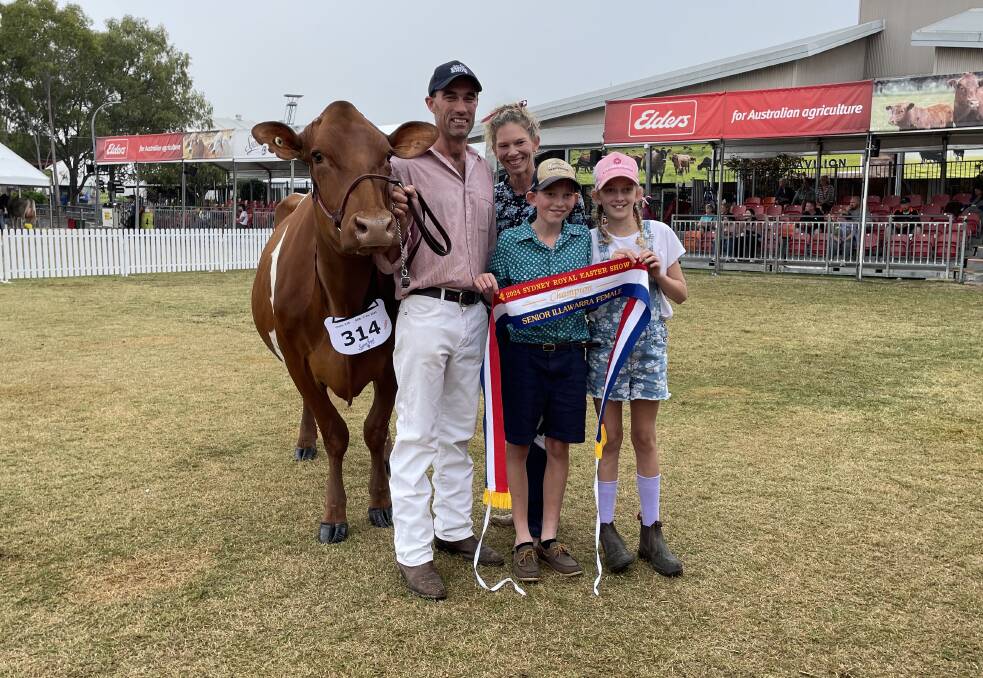 Senior champion Illawarra Kangawarra Jewel 6594, bred and exhibited by Tom and Kyleigh Cochrane with their children Hayden and Lucy.