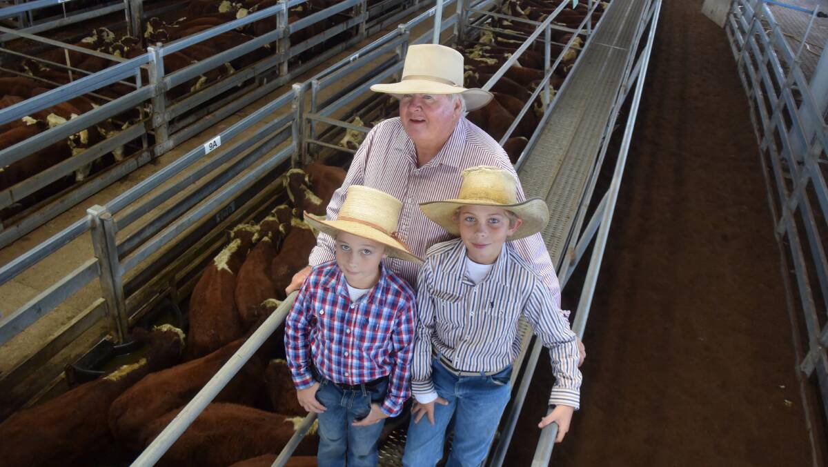 Champion Hereford steers went to John Smith, Woodenbong, with grandchildren Archie and Hughie.
