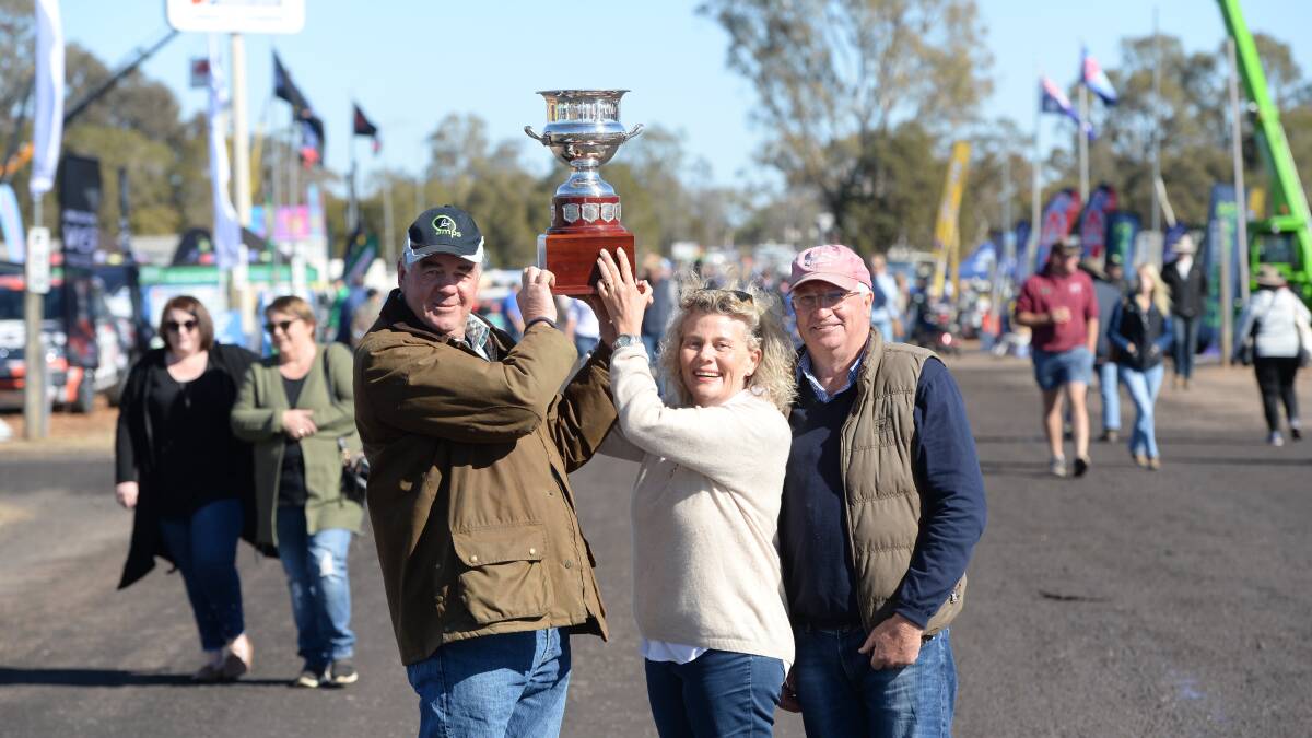 Agquip winners: Bundella farmers Ed and Fiona Simson with Gordon Brownhill following the families win of the coveted Brownill Cup at the AgQuip grains breakfast.