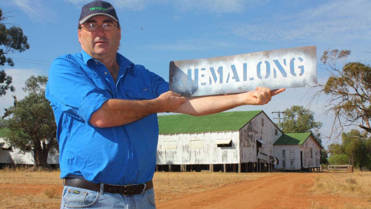 Twynam’s former general manager, agriculture, Bryan Goldsmith, displays a Jemalong wool stencil outside the historic woolshed, says the station has proved itself as an "ideal mixed farm".