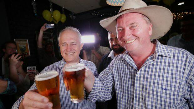 Prime Minister Malcolm Turnbull celebrates with the newly re-elected Barnaby Joyce in Tamworth. Photo: Alex Ellinghausen