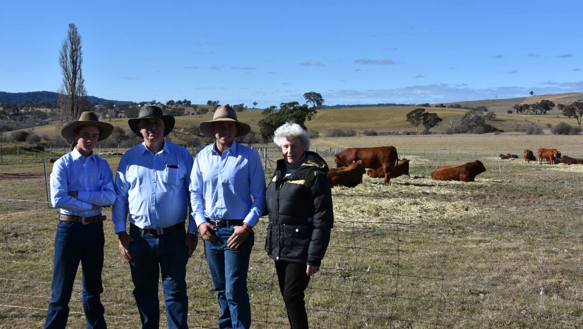 Purchaser of top price bull Jeff Demanuele, J & R Limousin, Camden, flanked by his junior managers Jayk Smith and Jayden Harmes alongside principal Longreach Limousins Carolyn Tooth