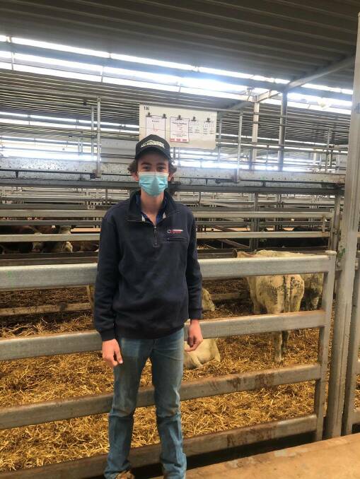 Harris Doodewaard, Corcoran Parker, with a pen of three Charolais-cross steers, 308kg from Trixton Holdings, Yea, Vic. They sold for $1320. Photo: NVLX