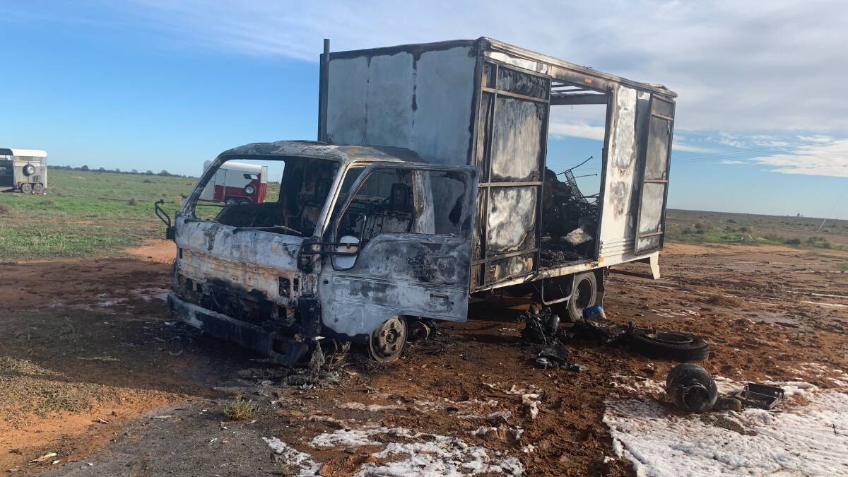 Police are investigating a fire that destroyed drover, Kevin Kernaghan's truck and caravan near Hay. Pictured here, the remains of the truck. Photo supplied. 