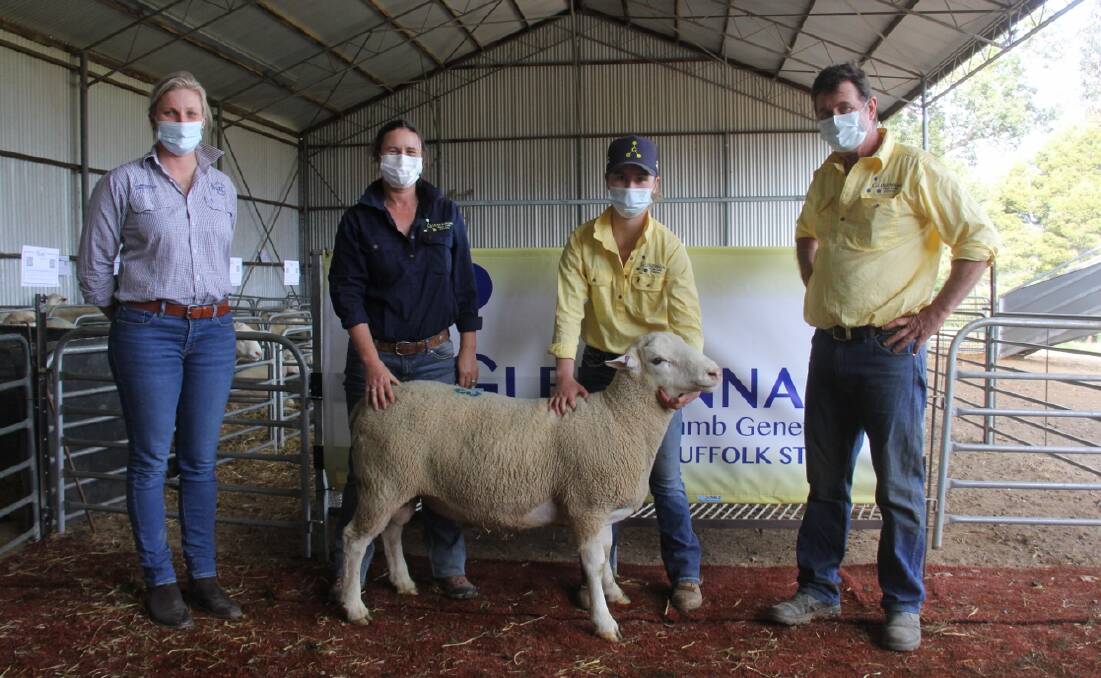 Sally Butt, Butt Livestock and Property, with Anna Hayes, Lucy Hayes and John Hayes, Glenfinnan, and one of the top-priced rams. Photo: Phill Butt 