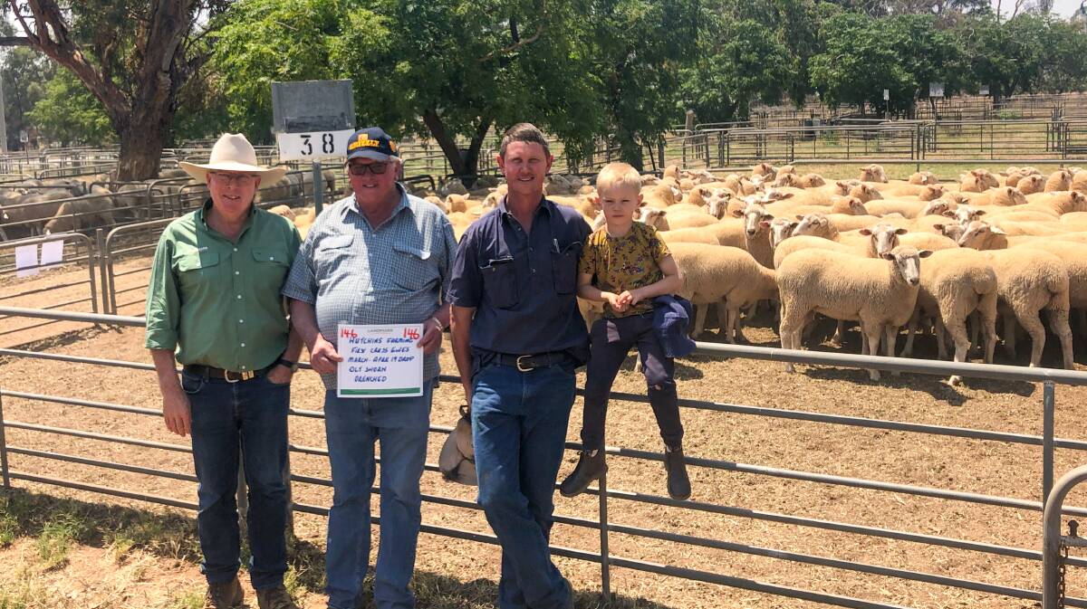 Kym Hannaford, Nutrien, Wagga Wagga with Grant, Hayden and Finnen Hutchins, Elaine, Narrandera. The Hutchins received the top price of the sale, $320/head paid for 146 March/April 2019-drop ewes. 