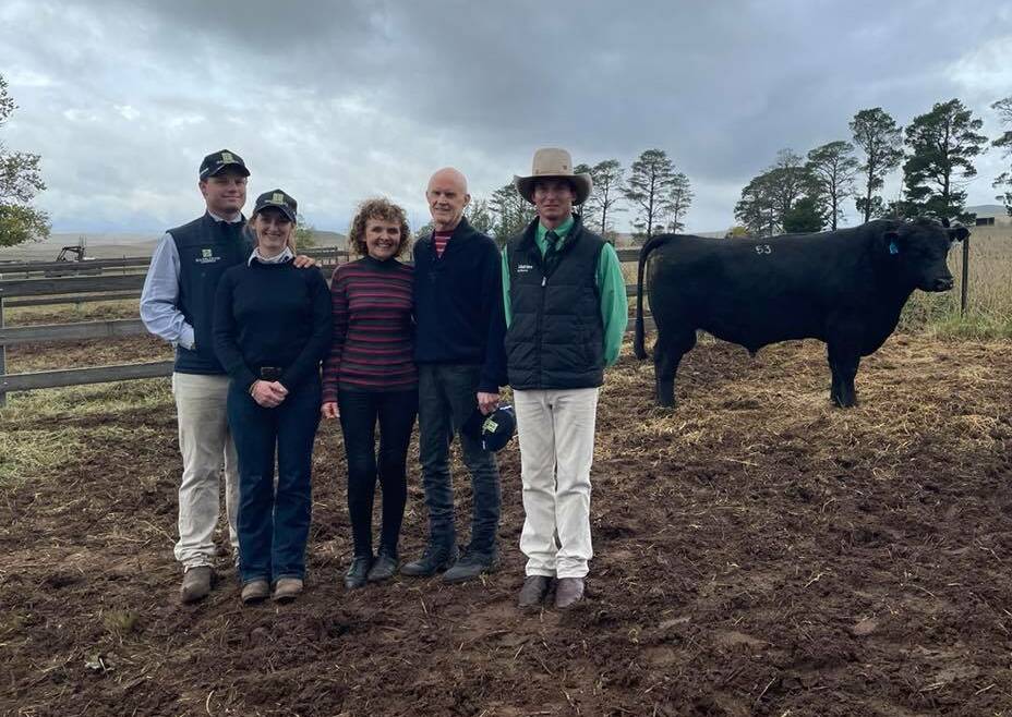 Hazeldean's Ed Bradley and Bea Bradley Litchfield with top price buyers Charles and Concepta O'Brien, Crookwell, Nutrien auctioneer Hamish McGeoch and the top priced bull, Hazeldean Q951, who sold for $25,000.