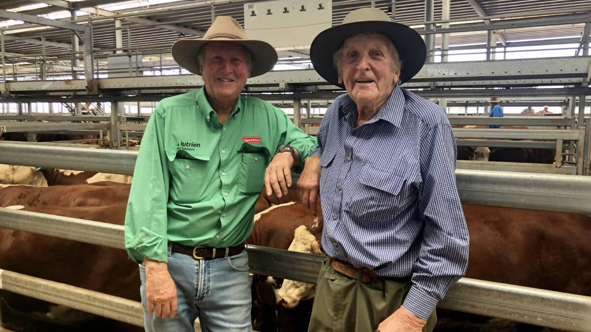 Arthur Trethowan with his friend and agent of 50 plus years, Michael Scollard of Paull and Scollard. Pictured at the Wodonga Annual Feature Female Sale where Mr Trethowan sold the last of his Hereford herd. 