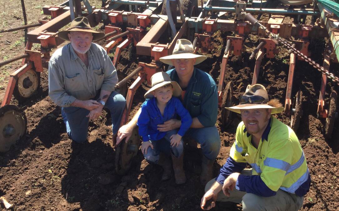 Ron, Peter, Nick and Mark Campbell of Woodlands, Merriwa, setting up for sowing oats.
