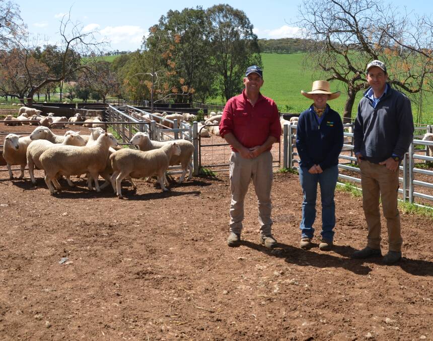 Buyers Ben Haseler and Daryl Clifton, Bowylie, Gundaroo with Karrawarra stud manager Hannah Anderson. Mr Haseler bought eight top tier Highlander rams from Karrawarra for their prime lamb operation, owned by Dick Smith. 