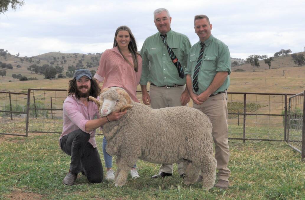 The top ram pictured with Sam and Ella Picker, Hillcreston Merino stud, and Landmark's Mark Barton and Rick Power. Photo: Supplied 