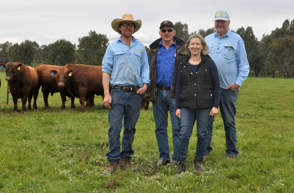 Tom and Andrew Hicks of Hicks Beef, Holbrook with Kevin and Libby Heggen of Hedley Range Red Angus, Binginwarri, Victoria, who purchased Red Angus bull, Hicks Premier N14, for a top price of $11,000.