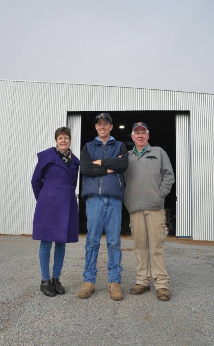 Vicki, Ben and Barry Langtry in front of their new fodder shed, built from funds accessed through the NSW government's Farm Innovation Fund. 