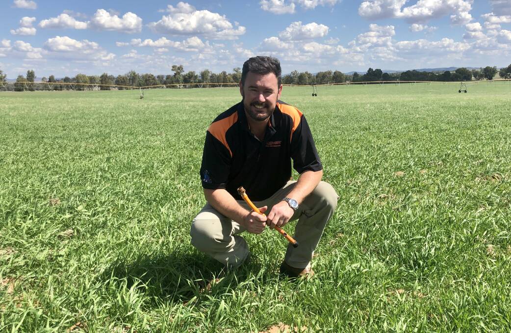 Australian Dragon Line distributor Tetaan Henning with part of Dragon Line's drip line tubing which is used to convert a pivot into drip irrigation. Pictured in Wagga Wagga at the site of one of the first Dragon Line projects in Australia. 