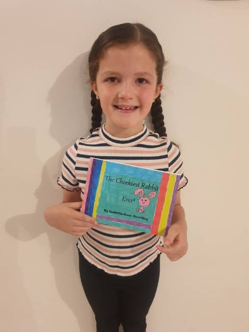 Yass Public School student Isabella-Rose Dowling with her book 'The Cheekiest Rabbit Ever!'