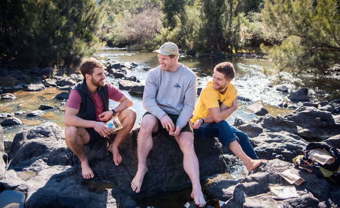 Barbell Foods' Luke and Rory Rathbone with former Wallabies captain David Pocock, a Barbell advocate. The idea for the meat snack company began with a camping trip. Photo: Barbell Foods