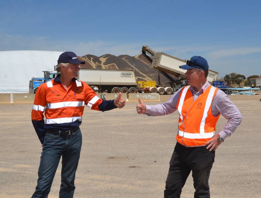 Pacific National CEO Dean Dalla Valle and GrainCorp COO Klaus Pamminger at GrainCorp's Junee receival site. 