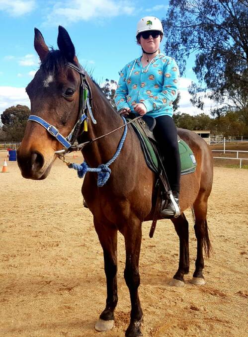Lillian Macquarie, 13, rides at the Wagga RDA branch. Pictured here with Barney. Photo supplied. 