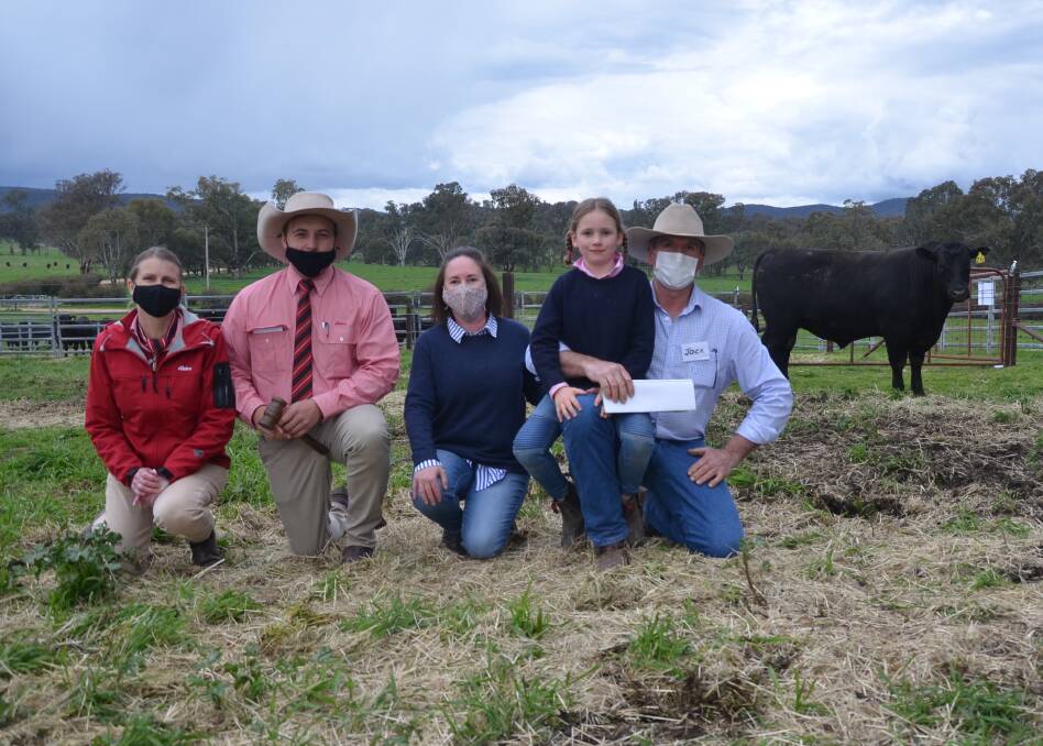 Elders' Jenni O'Sullivan and Lincoln McKinlay with Dunoon's Natasha, Arabella, 7, and Jock Harbison and the top priced bull, Dunoon Q1163, sold for $68,000 to Bongongo Angus, Coolac. 