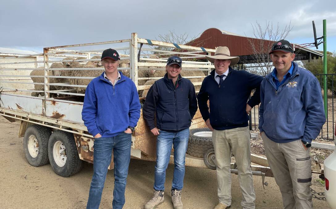 Volume buyers Tom, Nick and Peter Ungar, MV Ag, Alectown with their trailer load of rams and Woodpark Poll principal Stephen Huggins. 