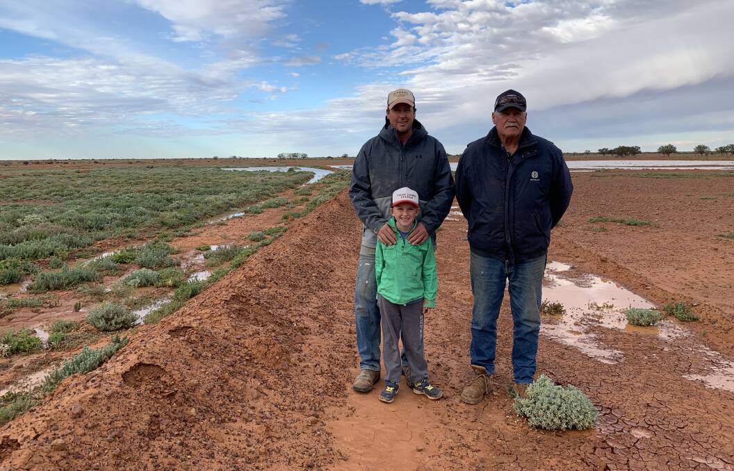 Jed, Clancy, 7, and Richard Wilson at Yalda Downs Station, White Cliffs. The Wilsons are members of the Far West Rangelands Rehydration Alliance. After recent significant rainfall in the area, the benefits of the their re-hydration works are in full view. Photo by Stacey Wilson.