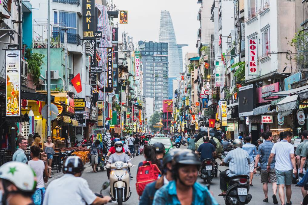 CITY LIFE: A colorful perspective of Bui Vien Street in downtown Ho Chi Minh City. Photo: David Bokuchava / Shutterstock.com.