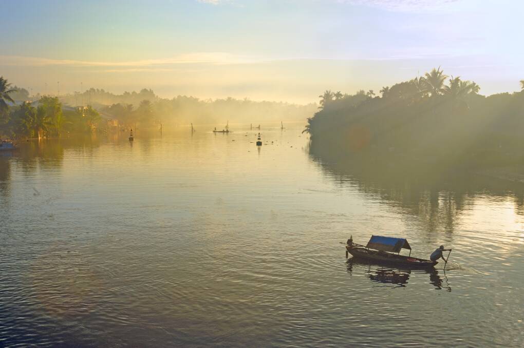 GOOD MORNING VIETNAM: A mystical morning haze on the Mekong Delta.  Photo: Shutterstock.com