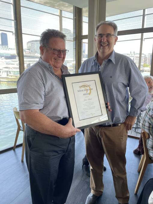 Australian Wool Industry Medal 2021 Recipient John Lewis with WIA deputy chairman Michael Jackson.
