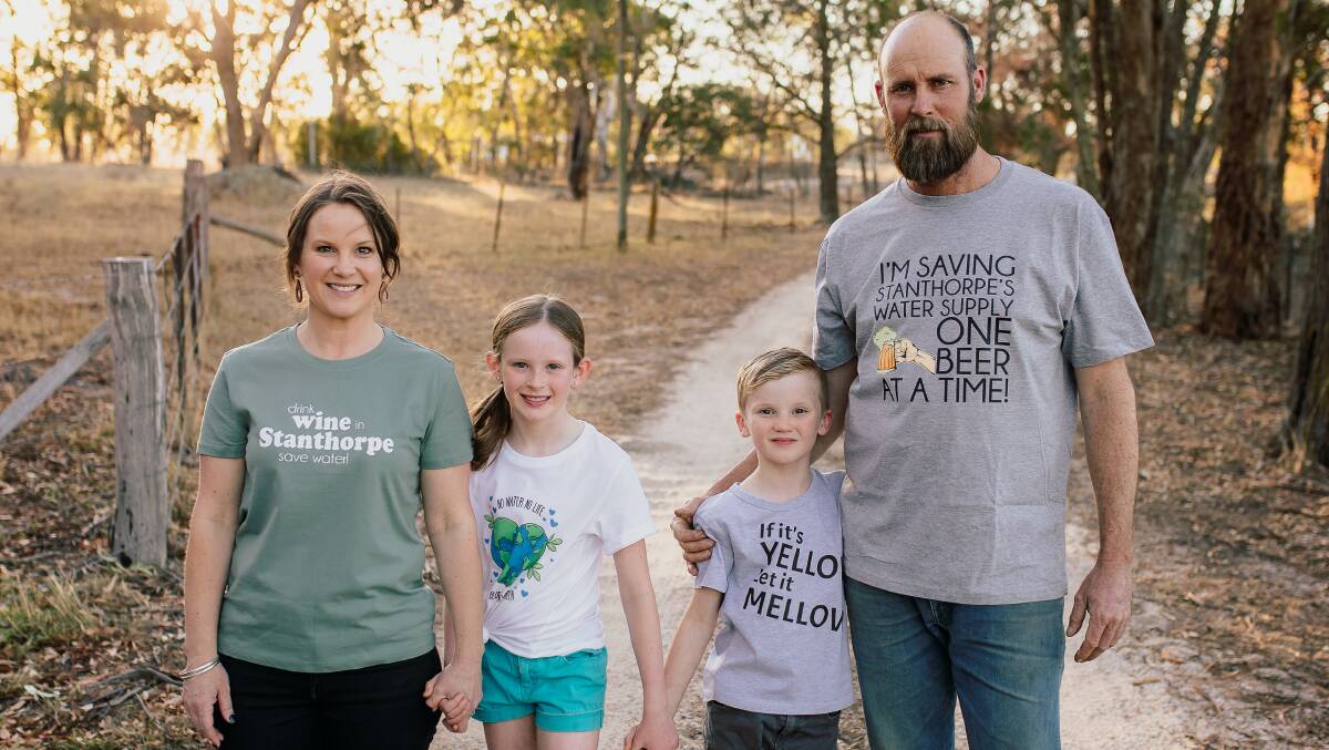 T-shirt creator Sarah Lupton, her children Martha and Archie and husband Ross model some of her range of Tilly & Wilbur Save Water designs. Photo- Christopher Visentin.