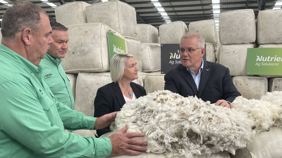  Nutrien Wool's Stewart Raine and John Tuskin with Liberal Lyons candidate Susie Bower and Prime Minister Scott Morrison ahead of the FTA announcement. 
