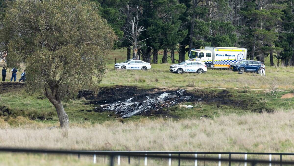 The light plane crash site at Gundaroo, where four people were killed on Friday. Picture by Gary Ramage