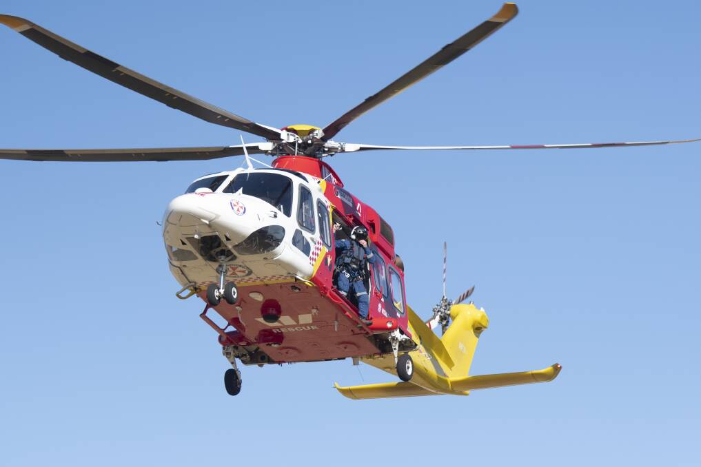 EMERGENCY: The Westpac Rescue Helicopter was called to the scene before midday, by NSW Ambulance. Photo: Mark Kriedemann