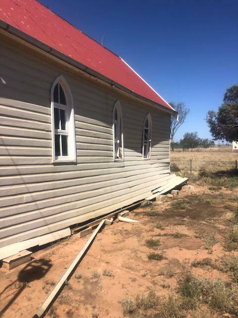 The Nevertire Anglican church blown off its stumps.