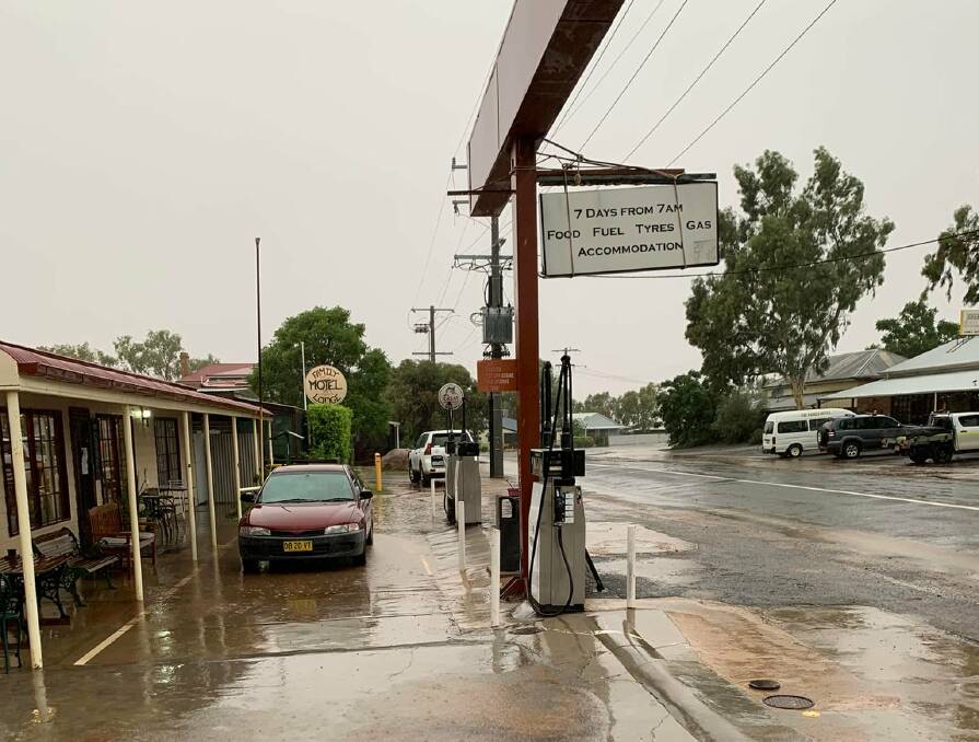 Wet at the Tibooburra store where 85mm fell on Monday afternoon turning roads into waterways. Photo by Vicki Jackson.