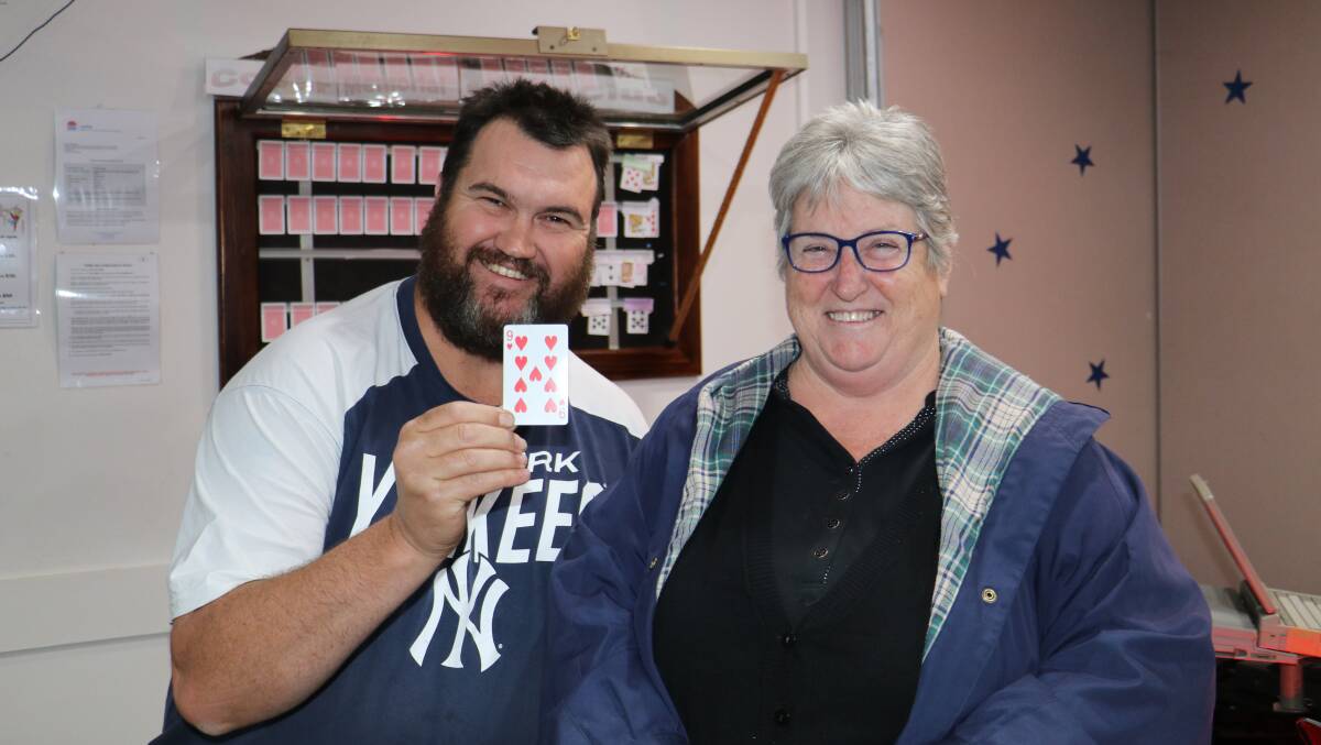 An ace place: Services Club manager Linda Carter with club patron Jarrod Marsden (who missed the Joker prize of $11,000). Photo courtesy of Cobar Weekly.