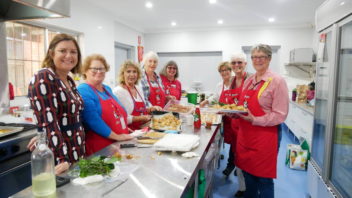 Federal Eden-Monaro MP Kristy McBain with Bega CWA delegates Annette Kennewell, Nelleke Gorton, Alison Jenkins, Helen Galton, Vicki Hummel, Lynn Lawson and Robyn Wright keeping the faithful fed at the CWA NSW annual conference in Bega. Photo by Ellouise Bailey.