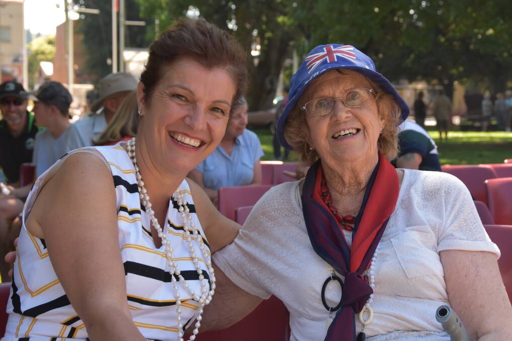 Australia Day ambassador to Cooma Emma Rossi gets to meet a happy local at the Cooma celebrations.