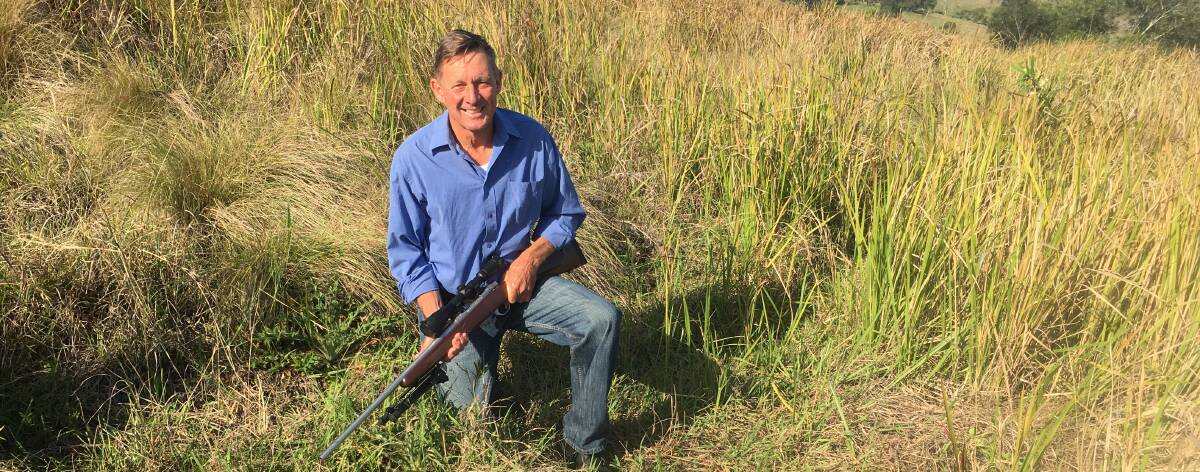 Tom Amey after shooting the wild dog that killed his own pet dog.