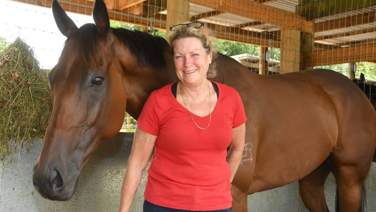 Gosford-based conditioner, Angela Davies, with her stakes-placed galloper, Through The Cracks, at her stables at Narara on the Central Coast. Photo: Virginia Harvey