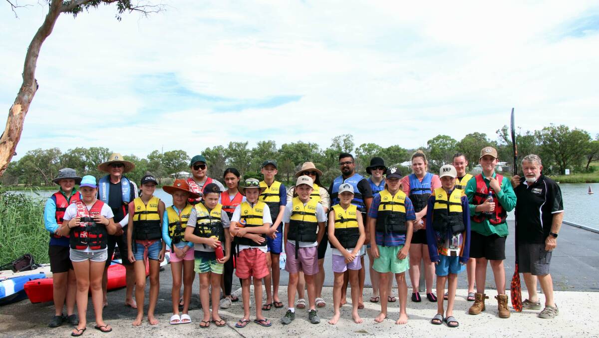 Rural kids at Lake Inverell in January this year enjoying a kayaking event made possible by support from the NSW Government's Summer Break program.