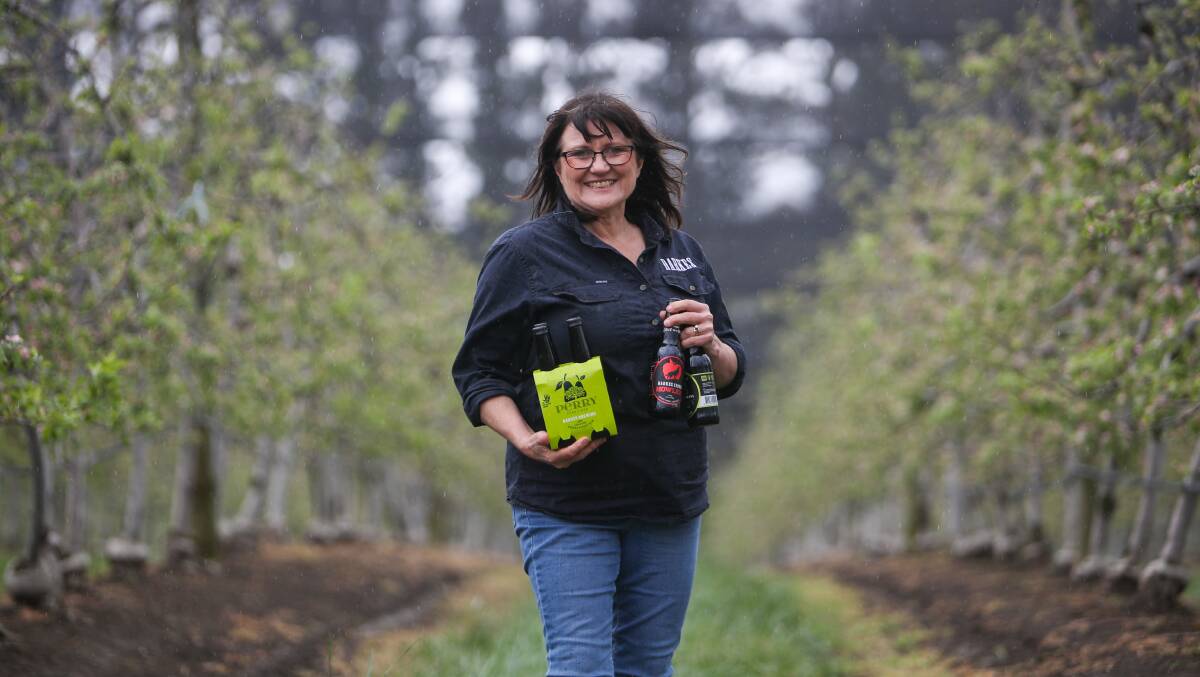 Glenbernie Orchard owner Jo-Anne Fahey with her family's world award-winning Darkes ciders from Darkes Forest, in the north Illawarra. Photo by Adam McLean.