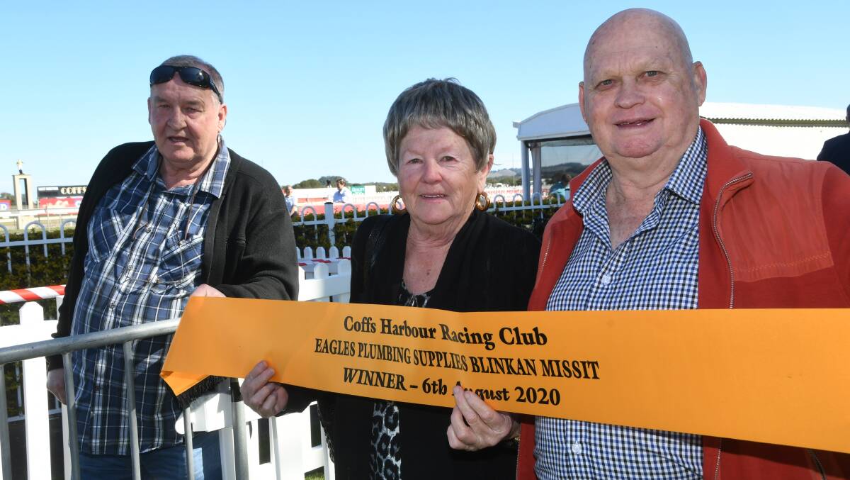 Winning Coffs Harbour trainer Graham Payne, with part-owners Aileen and Darrell Kidd from Newcastle after Yulong Knight's win. Photo Virginia Harvey. 