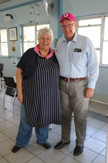 Parkes MP Mark Coultan is one of many to drop in to Katrina's Moree fish shop for a chat. They have an old family connection.