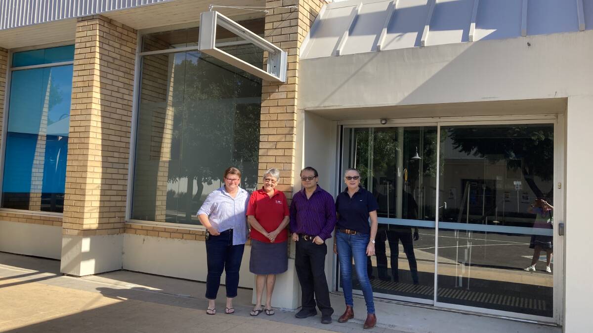Wee Waa business people outside the closed ANZ Bank branch that they wanted to stay open. The closure has hurt their operations. From left, Carlie Gray, Roxanne Whitton, Tien On and Jane Harrison. Photo by Janelle Schwager.