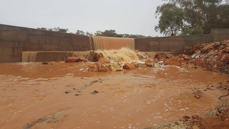 A dam at the University of NSW Arid Research Station at Fowlers Gap in Far West NSW has filled and overflowed for the first time in two years.