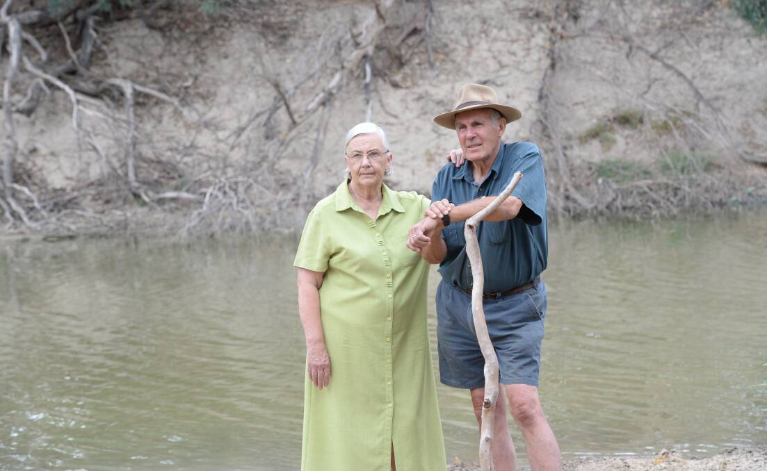 Chris and Bill Elliott at the old weir this year, say a new weir can't come soon enough at Wilcannia.